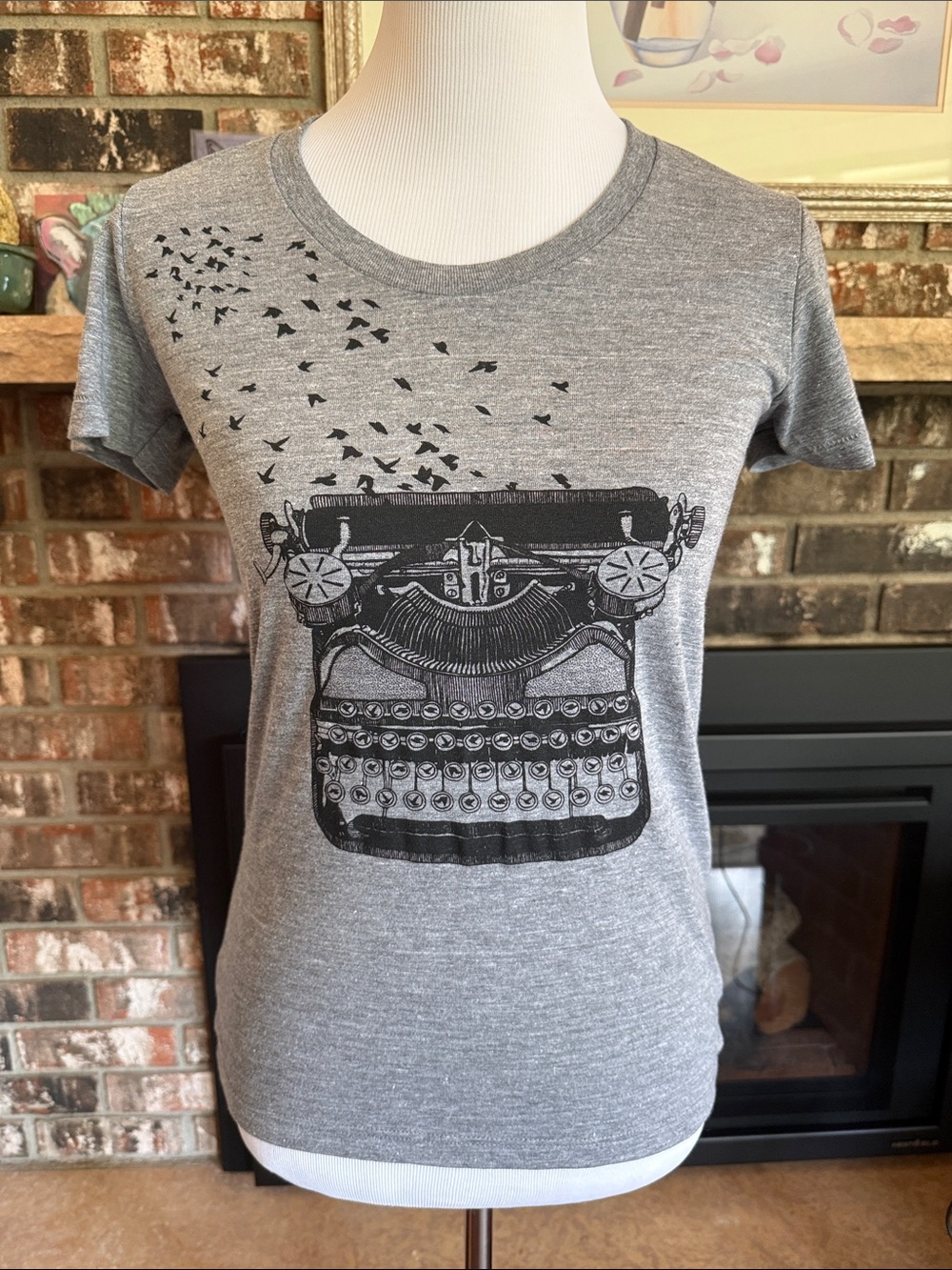 Graphic t-shirt. Vintage style typewriter with birds image. Runs small!